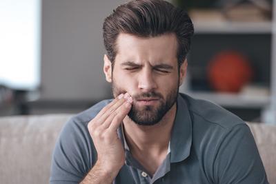 man with tooth pain at dentist in st cloud fl