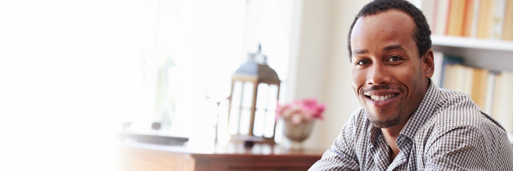Man smiling with dental crowns in St Cloud FL