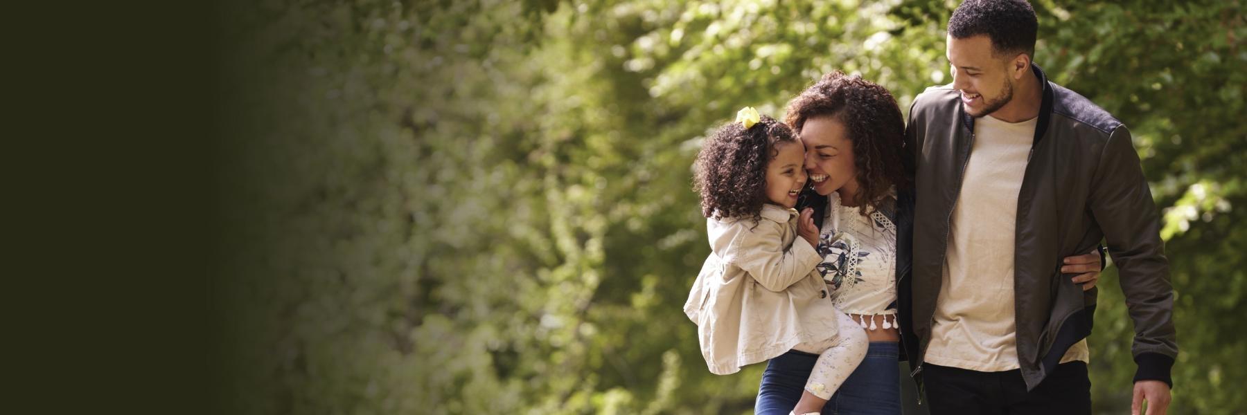 Family walking in the woods | Dental Implants St Cloud FL 