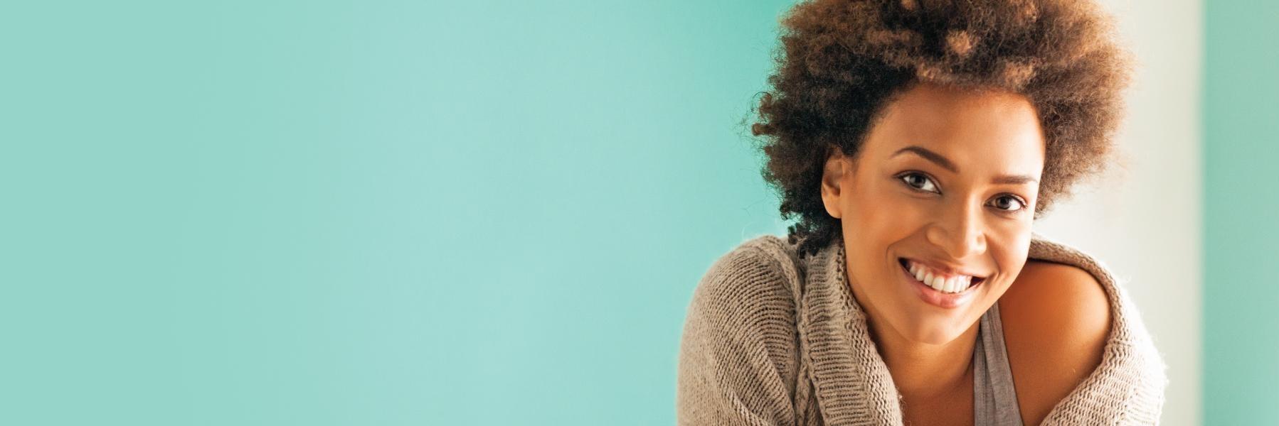 Woman smiling wearing dental implants in St Cloud | 34772 Dentist Office