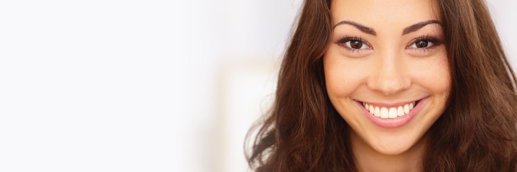 Woman Smiling | Bruxism Treatment St Cloud 