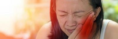 woman suffering from teeth grinding pain in st cloud fl