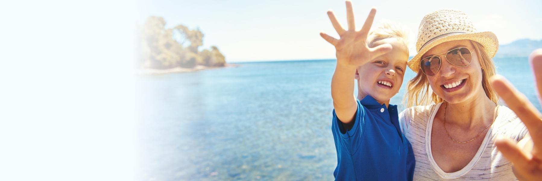Mother & son on the beach | general dentist st cloud fl